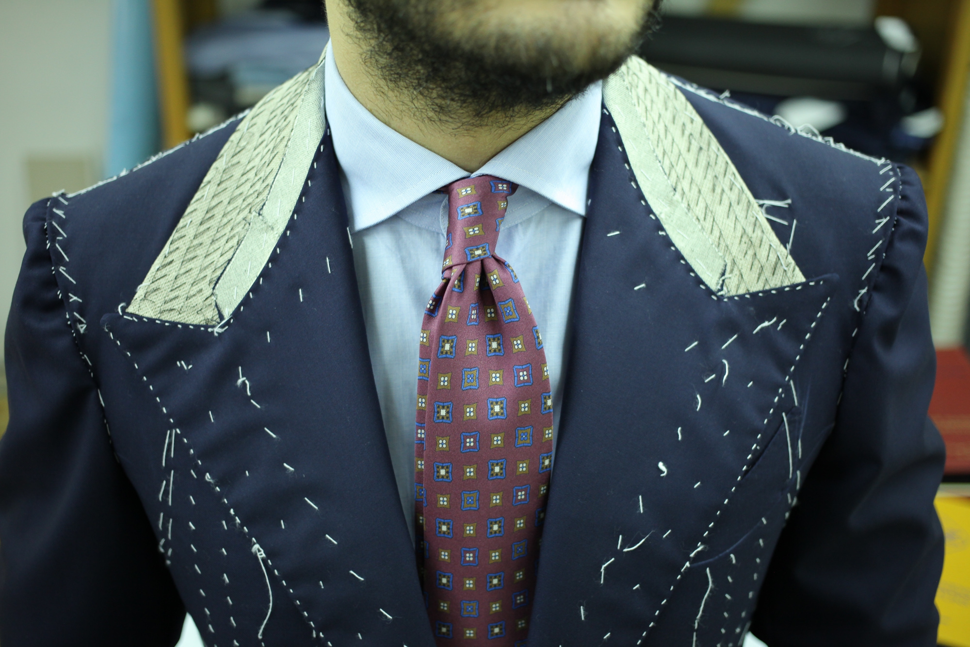 Edesim - Concave Lapel Line Fitting of a three-piece suit made from Holland&Sherry fabric